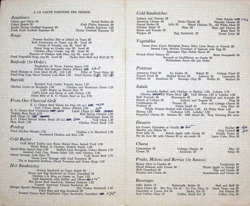 A la carte menu page — Printed restaurant menu headed "A LA CARTE PORTIONS PER PERSON" with sections for Appetizers, Soups, Seafoods, Specials, Charcoal Grill, Poultry, Cold Buffet, Sandwiches, Vegetables, Salads, Desserts, and Beverages. Includes a "Menger Special Sandwich" and "Menger Special Salad Plate". Several prices have handwritten ink corrections.