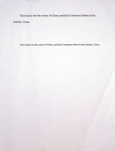 Note: home at Cherry & Commerce — Typed text on a near-blank page (appearing twice): "Their home was the corner of Cherry and East Commerce Street in San Antonio, Texas." Otherwise blank.